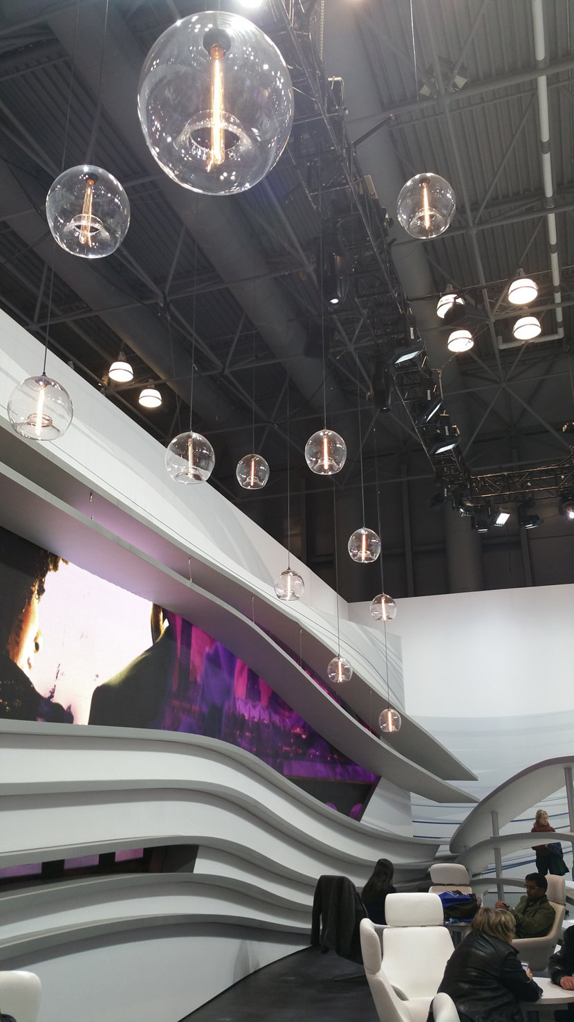 Clear glass pendant lighting at the International Auto Show