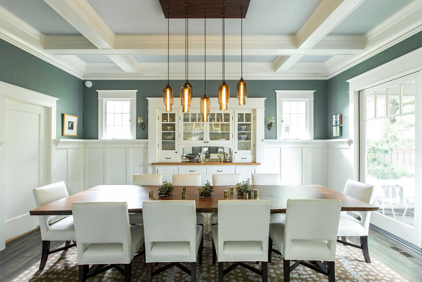 Modern pendant lighting is the spotlight of this dining room