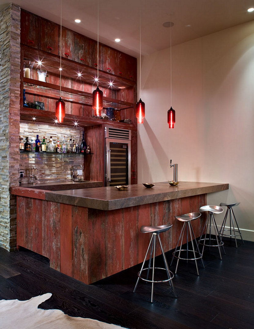 Modern pendant lighting makes a bold statement above a bar