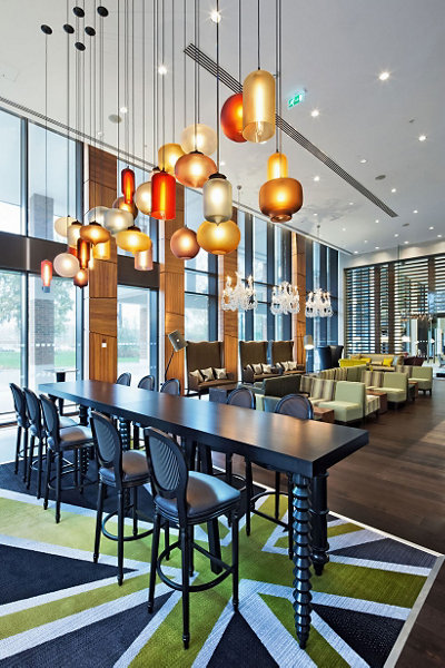 colored glass pendant lighting above table