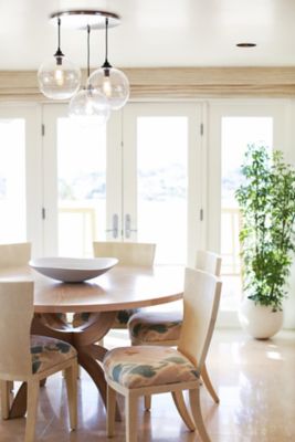 Circular Modern Chandelier Makes a Statement in These 3 Interiors