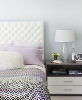 modern bedroom with purple accents