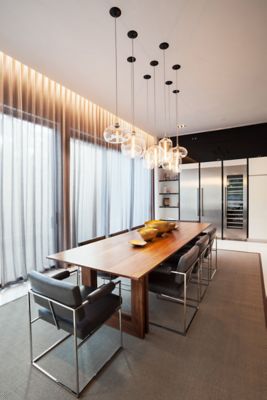 clear glass pendant lighting above table