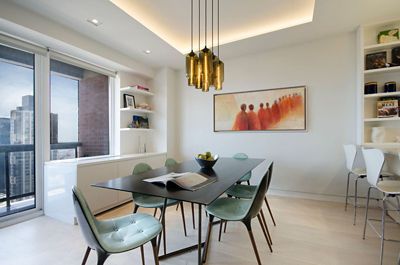 Penthouse with Modern Pendant Chandelier Featured in Domino Magazine