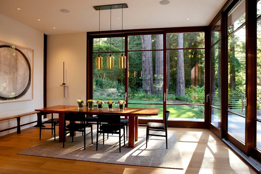 Dining room warms up with Amber pendant lighting