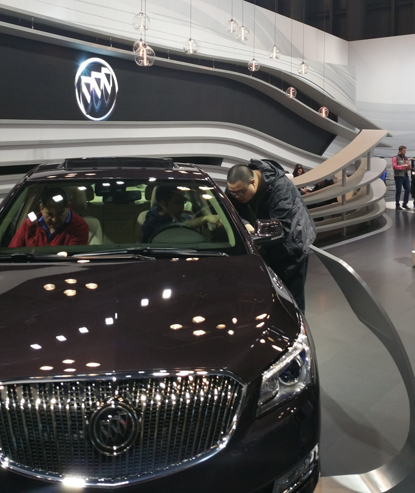 The Buick Lounge at the International Auto Show displays glass pendant lighting.