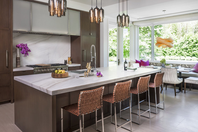 Modern pendant lighting makes a statement above this kitchen island