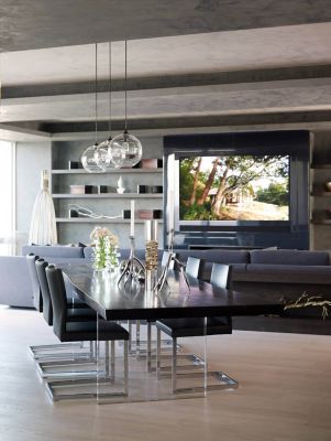 Clear Glass Modern Pendants Over a Dark Wood Dining Table