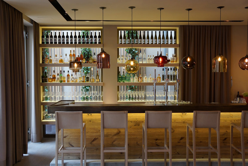 hotel bar with modern glass pendant lighting