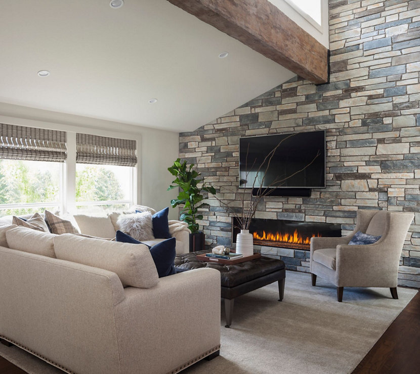 Stone Accent Wall and Natural Color Palette Helps Tie Room Together