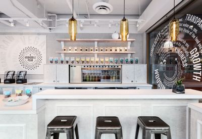 amber glass pendant lighting above counter