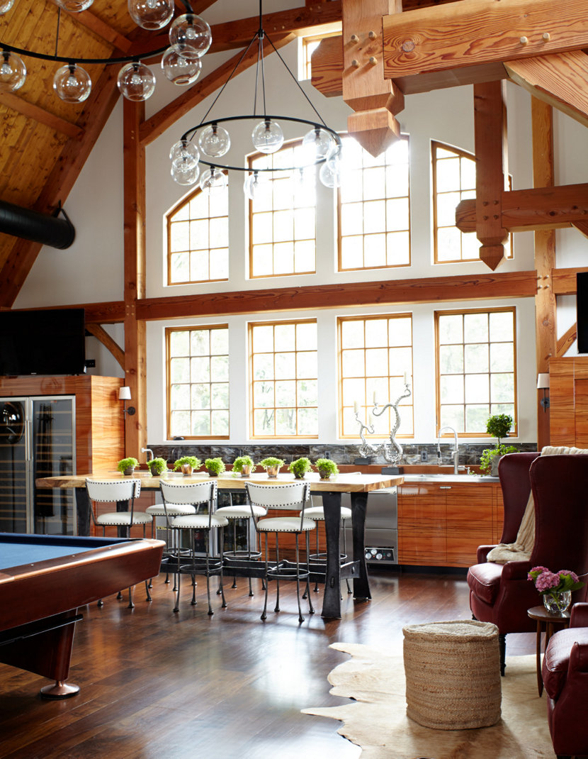 Niche Contemporary Chandeliers Hang in the Barn Loft