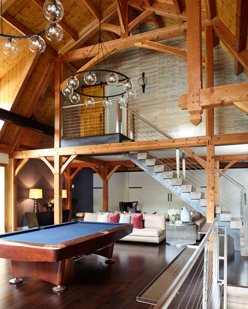 Contemporary Chandeliers Hang Over Billiards Table